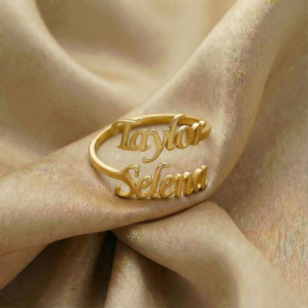 Personalized name ring, one-size in gold finish on beige silk fabric