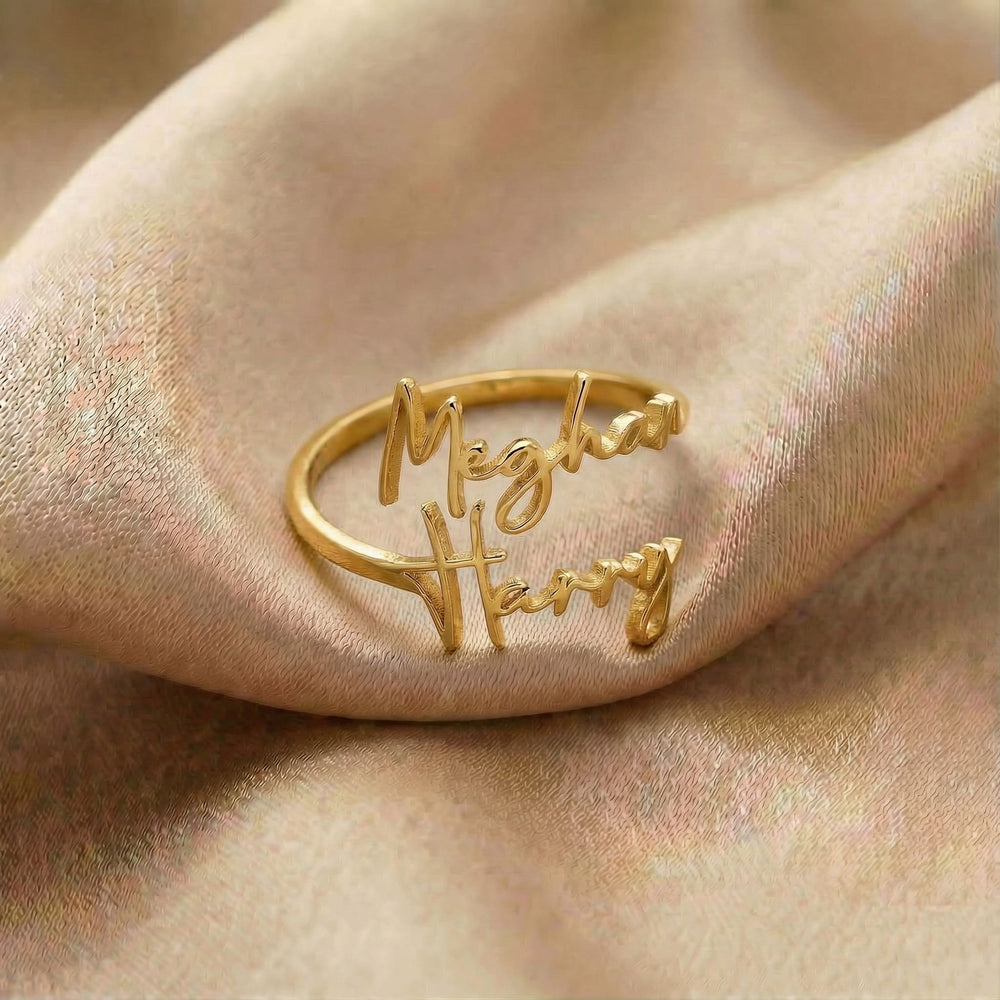 Personalized name ring, one-size in gold finish on beige silk fabric