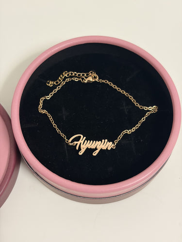 Custom K-pop name bracelet in rose gold showing Hyunjin in Korean Hangul script.
